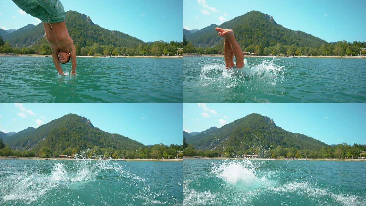 慢动作: 嬉戏的男性游客在炎热的夏日跳入湖中。