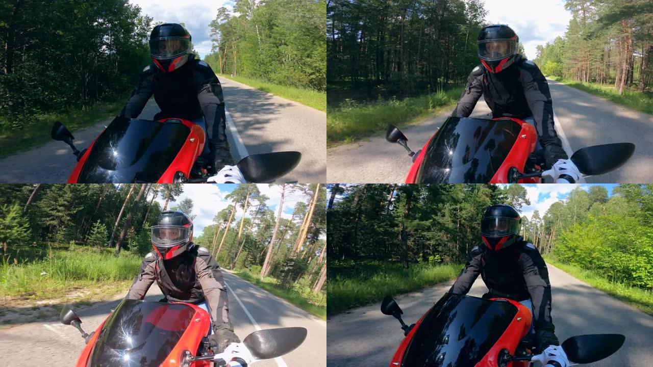 戴着头盔的司机在路上骑摩托车。