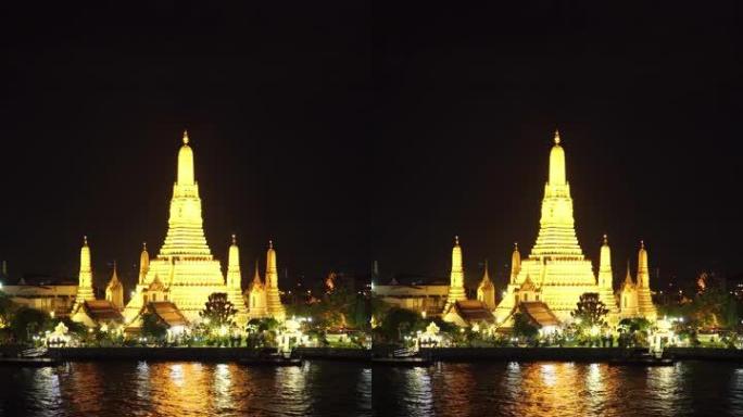 垂直拍摄:晚上的黎明寺，曼谷，泰国。