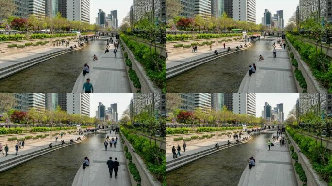 延时: 韩国西欧市中心清溪川运河的行人
