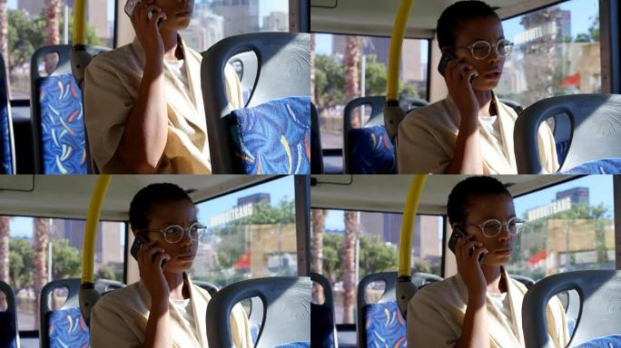 女性通勤者在乘坐公共汽车4k时用手机通话