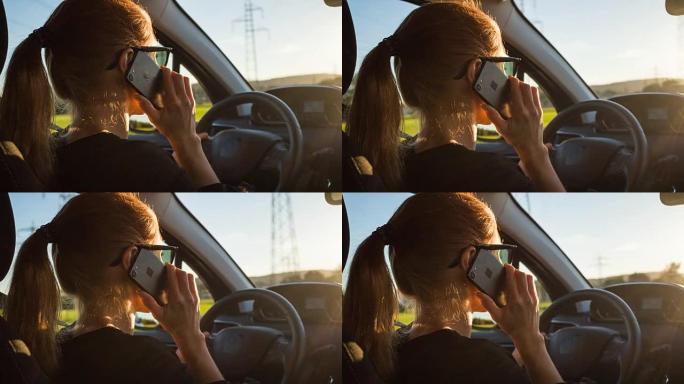 鲁莽的女司机在开车时使用电话危及自己和他人的安全