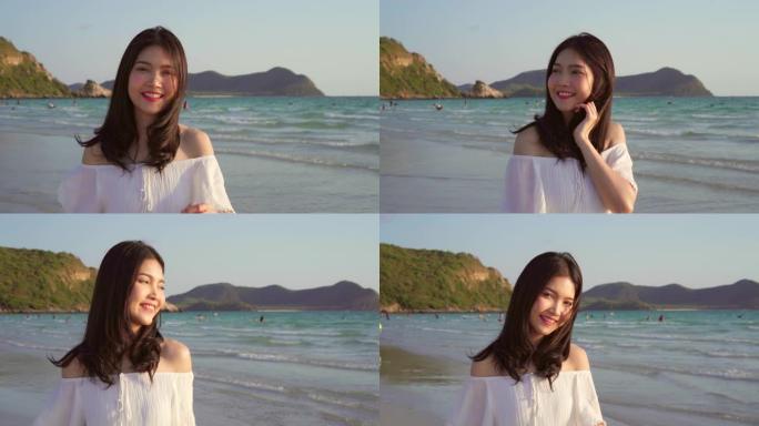 年轻的亚洲女人在海滩上散步。晚上日落时，美丽的女性快乐放松在海边的海滩上散步。生活方式女性在海滩上旅