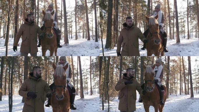 女人在冬季森林骑马和男朋友聊天