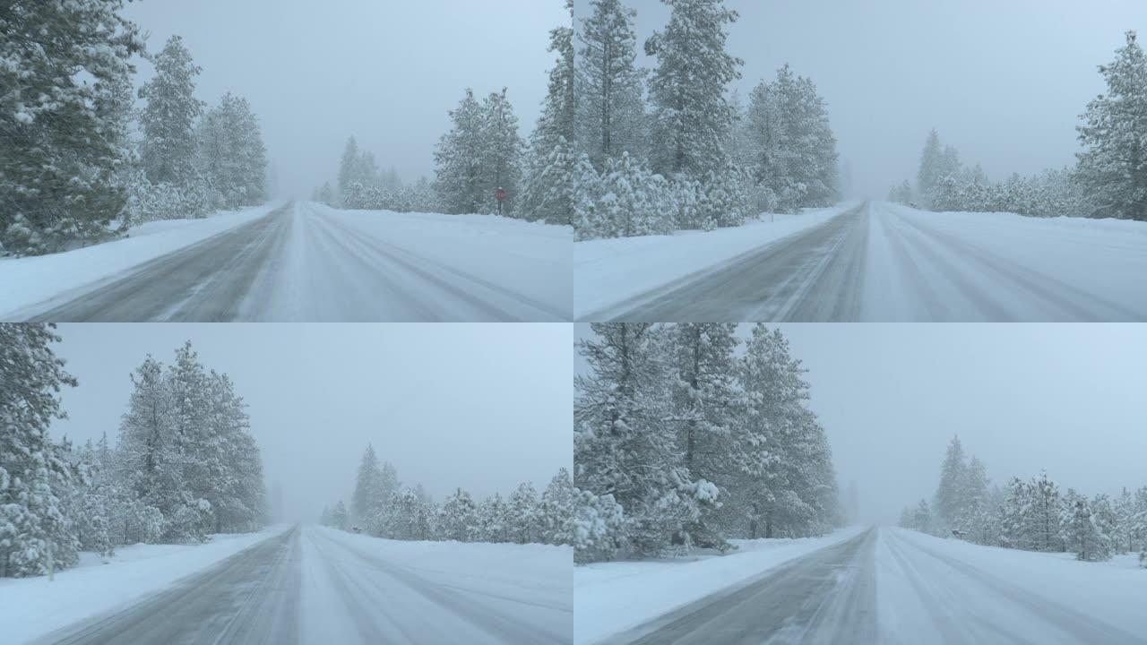 POV: 在一场严重的暴风雪中，在华盛顿的一条白雪皑皑的乡村道路上行驶。