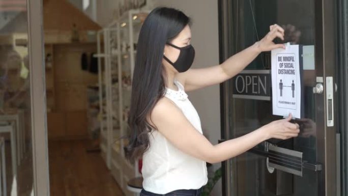 小企业主在新型冠状病毒肺炎封锁后重新打开商店的门