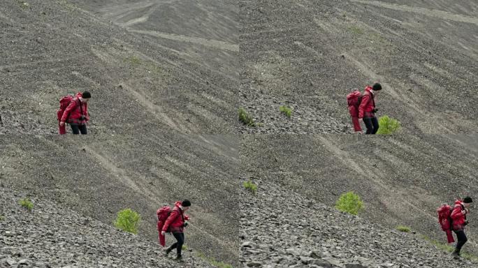 单人女徒步旅行者下坡