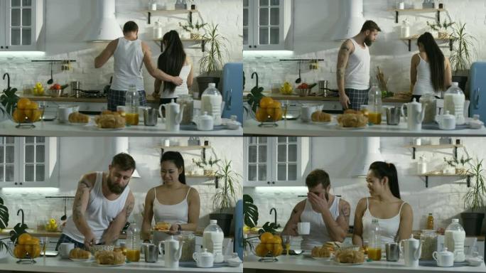 丈夫和妻子一起在厨房吃早餐