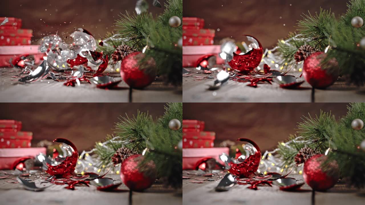 SLO MO圣诞球落在地板上，被压成碎片