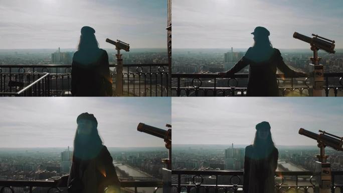 镜头跟随年轻美丽的旅游女子摆姿势，在巴黎埃菲尔铁塔慢动作的角度微笑。