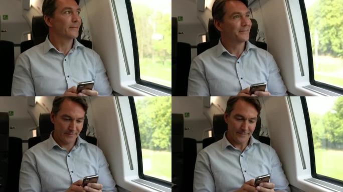 高加索人在火车上通勤，在智能手机上发短信，看起来很高兴