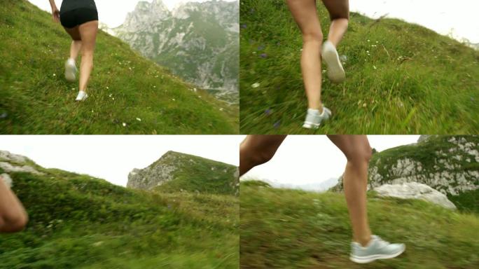 SLO MO女人在山脊上奔跑