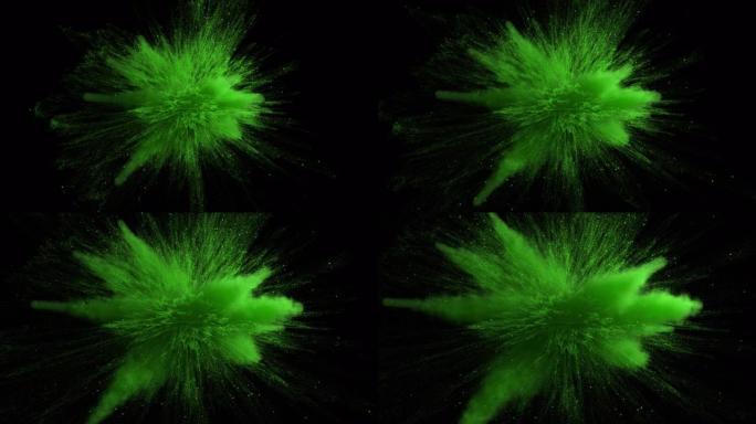黑色孤立背景上的绿色粉末爆炸