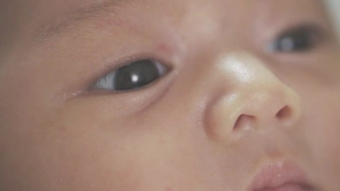 4k镜头在亚洲婴儿新生眼睛上关闭