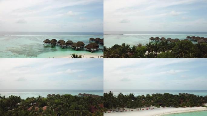 空中飞行无人机视图马尔代夫白色沙滩在阳光明媚的热带天堂岛与水蓝色的天空海水海洋