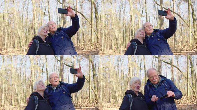 快乐的老年夫妇在徒步旅行中自拍