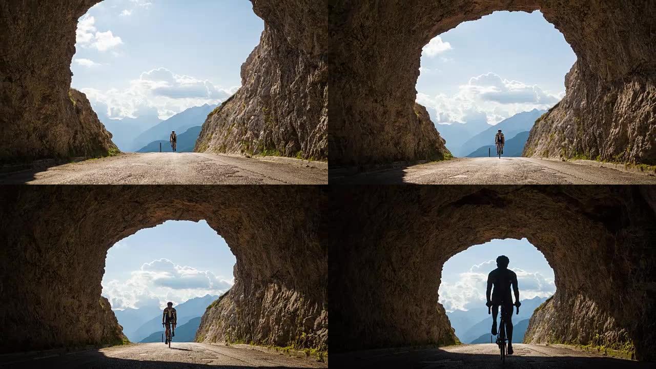 骑自行车进入岩石隧道