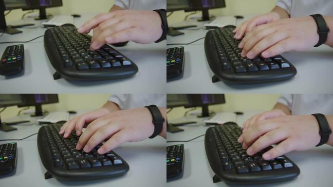 护士在办公室用电脑键盘打字