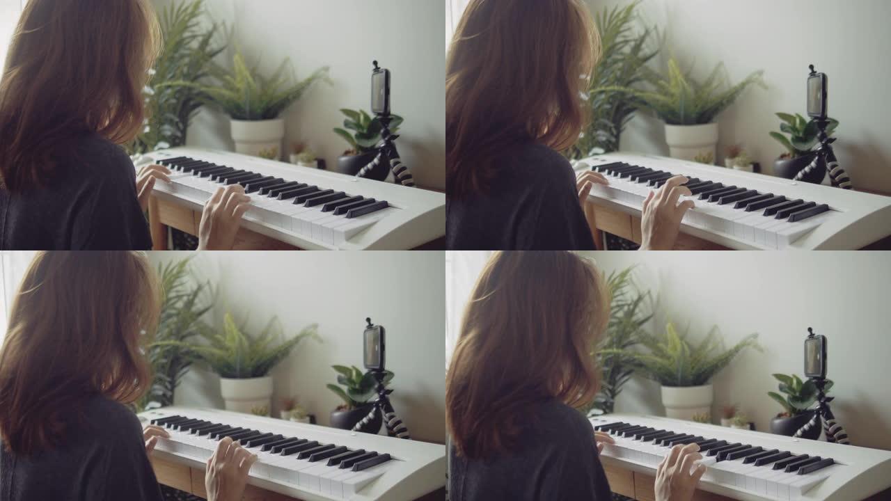 千禧一代女性在家学习弹奏键盘钢琴