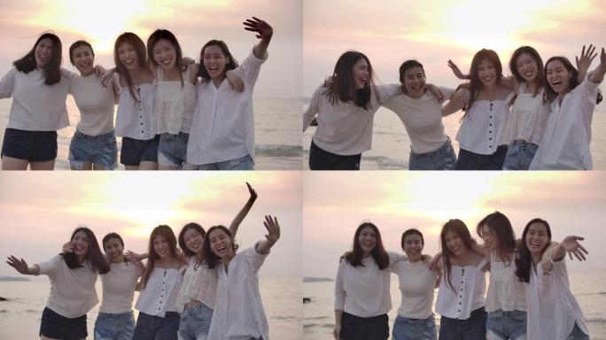 慢动作亚洲女性朋友在海滩上玩得开心