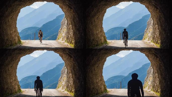公路自行车手进入山区的岩石隧道