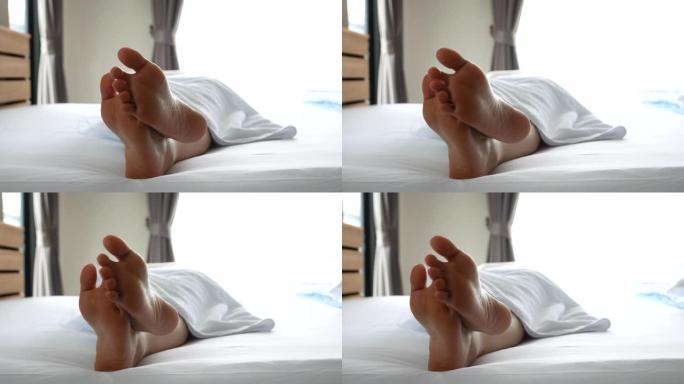 女人在床上放松丫双足拇指