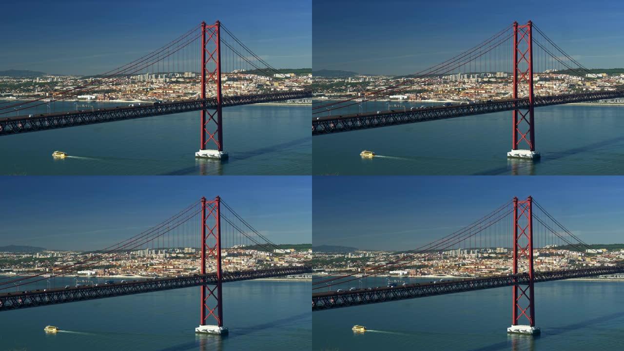 葡萄牙里斯本。在晴朗的晴天，横跨塔霍河的 '25 de Abril' 大桥上的汽车交通。4K