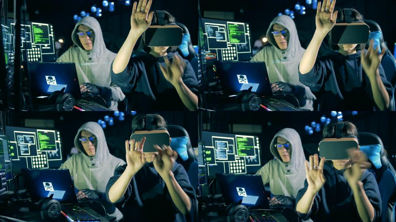 男黑客和他戴VR眼镜的女同事正在工作