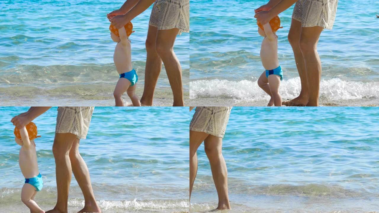 在度假时，妈妈一步一步地在海滩上向他的小宝宝迈出了第一步，新生儿学会了走路...