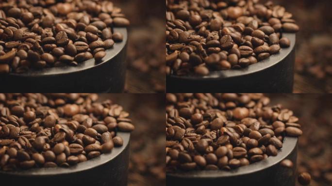 咖啡豆掉落在容器中的特写镜头