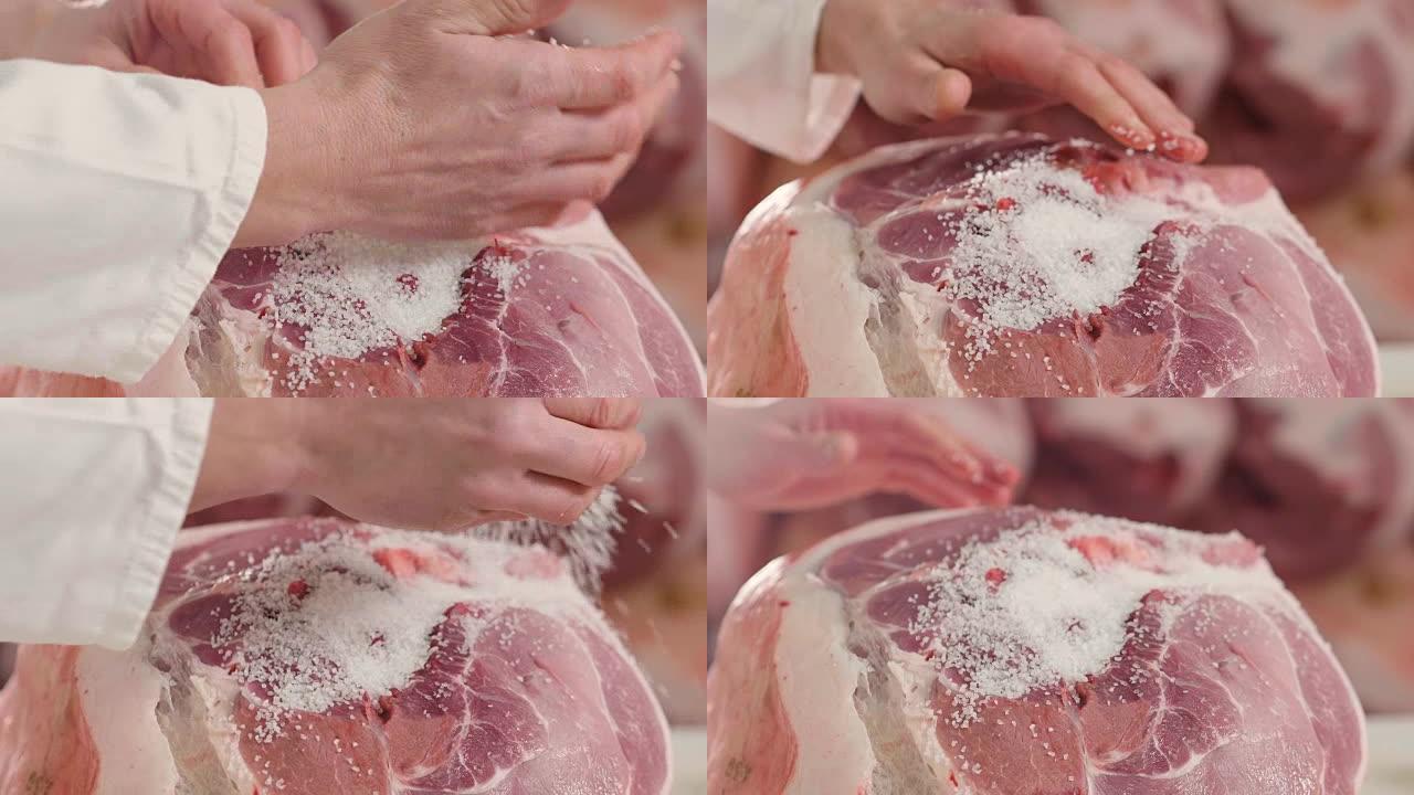 在火腿工厂中，火腿是按照意大利古代传统的教导手工腌制的。