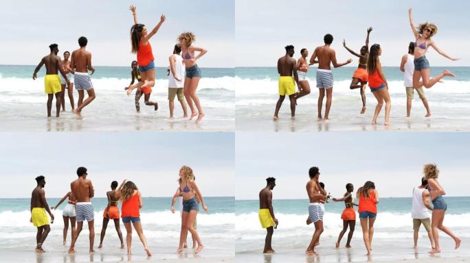 一群混血朋友在海滩上跳舞4k