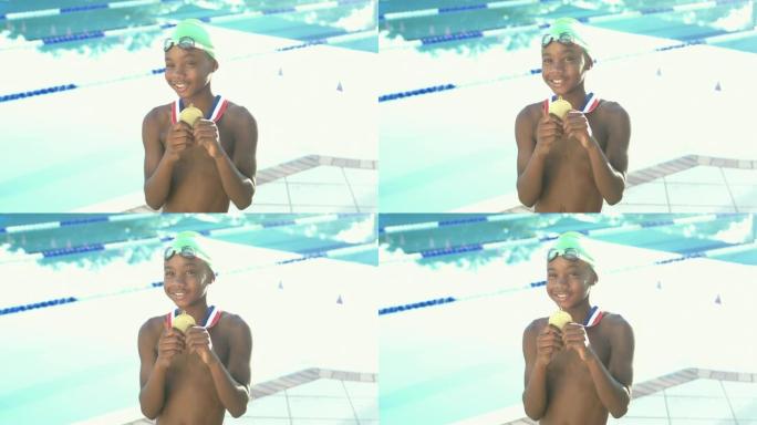 游泳运动员为赢得比赛而获得奖牌