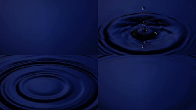 慢动作: 水滴变成蓝色的水。
