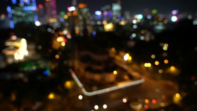 4k镜头速度模糊的场景从西贡巴黎圣母院大教堂的城市生活中散焦的光线从越南胡志明市夜间bokeh的俯视