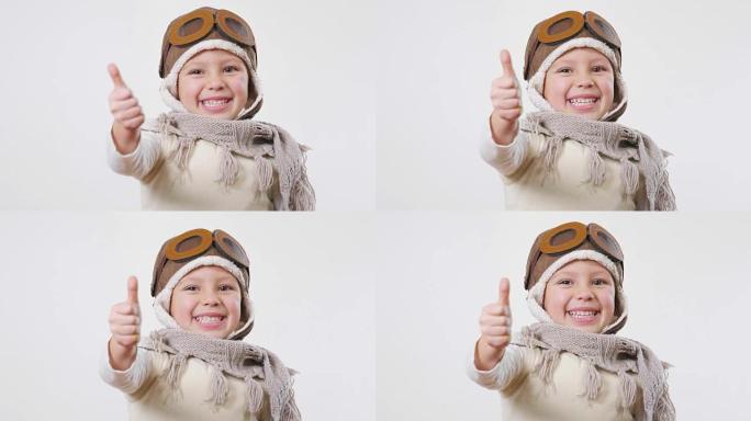 一个女孩的肖像，打扮成飞行员或飞行员，戴着帽子和眼镜，微笑着看着相机，她睁着眼睛做梦，想着未来。