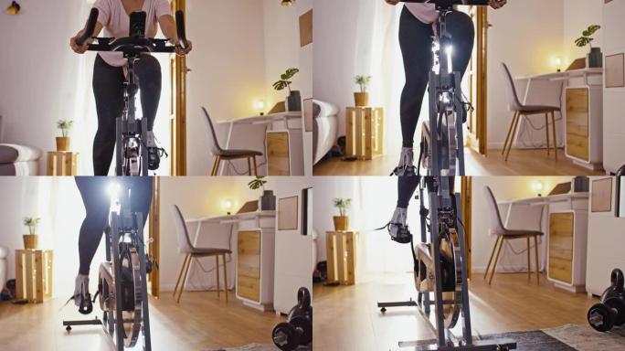 SLO MO Mid成年女性骑健身车