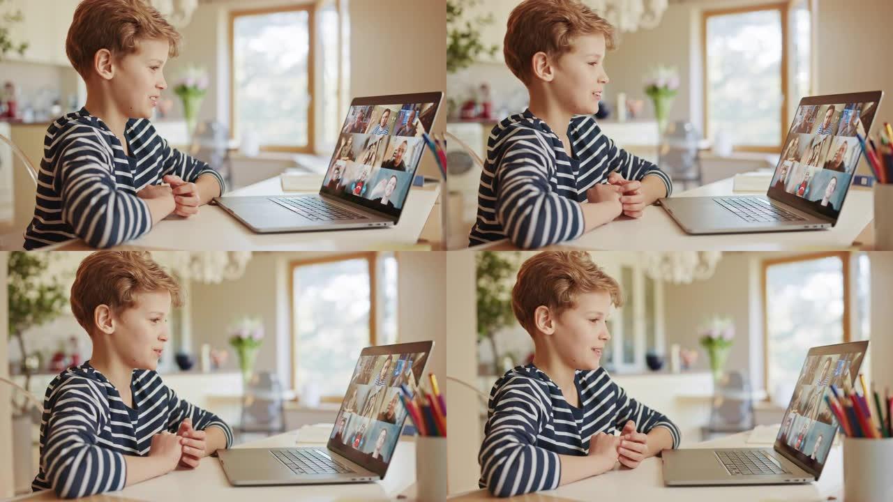 可爱的小男孩使用带有会议视频通话软件的笔记本电脑与一群亲戚和朋友交谈。他向家人打招呼，他们向后挥手。