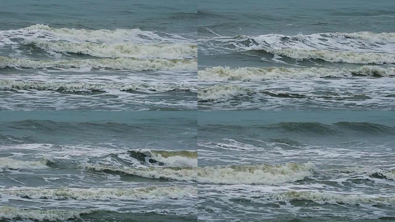 海浪撞击并溅到海滩上，慢动作