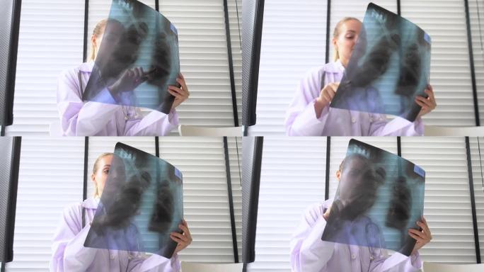医生女人在看x射线图像