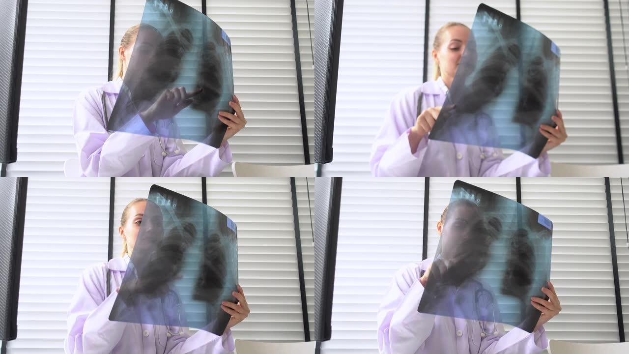 医生女人在看x射线图像