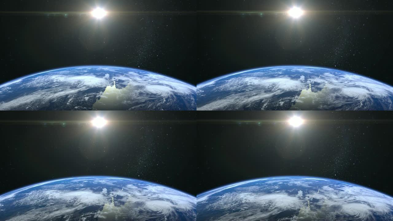 来自太空的地球。星星闪烁。飞越地球。4K.日出。地球缓慢旋转。现实的氛围。3D体积云。太阳在框架中。