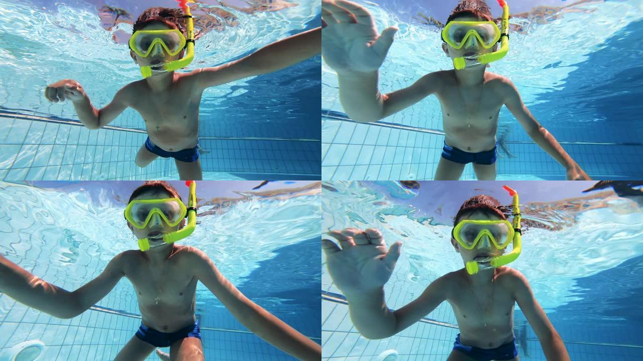 一个孩子戴着潜水面具试图游泳