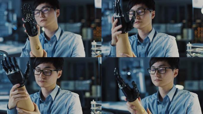 由专业的日本开发工程师在具有现代计算机设备的高科技研究实验室中测试的未来派假肢机器人手臂的特写。