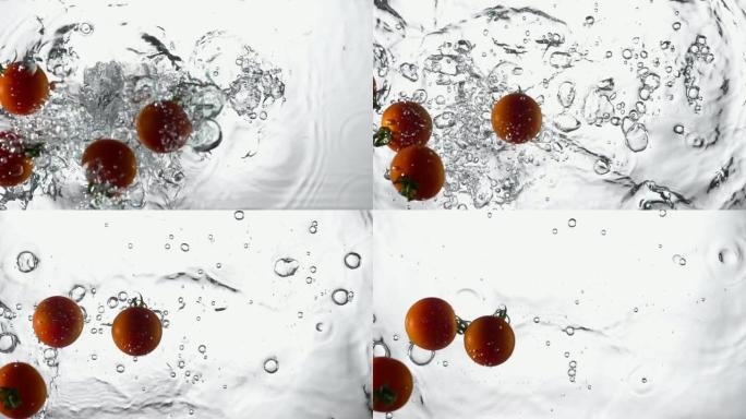 番茄的慢动作掉入水中并飞溅。