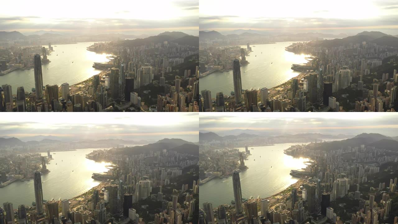 鸟瞰图日出的香港城市天际线与黄昏和金色天空4k股票视频。