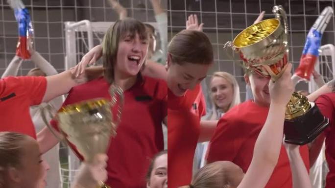 女子足球队庆祝杯赛胜利