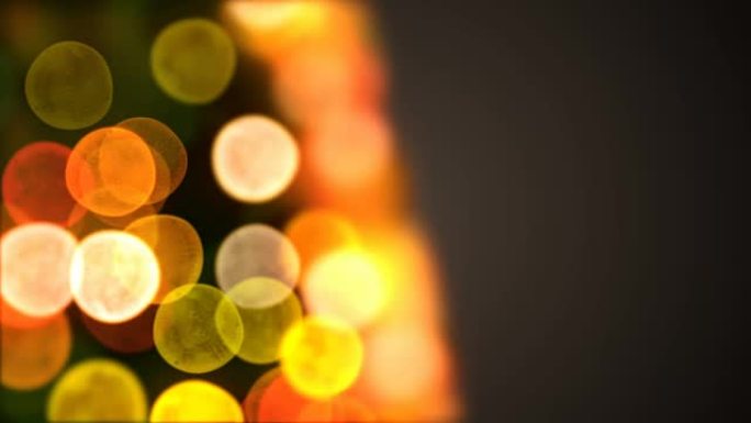美丽的特写圣诞树灯光在模糊的Bokeh中闪烁和转动。循环3d动画。圣诞快乐，新年快乐。