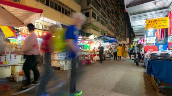 延时: 香港九龙弥敦道旺角夜间行人游客拥挤购物法源跳蚤市场