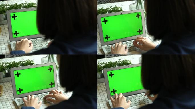 女人使用绿屏电脑绿屏